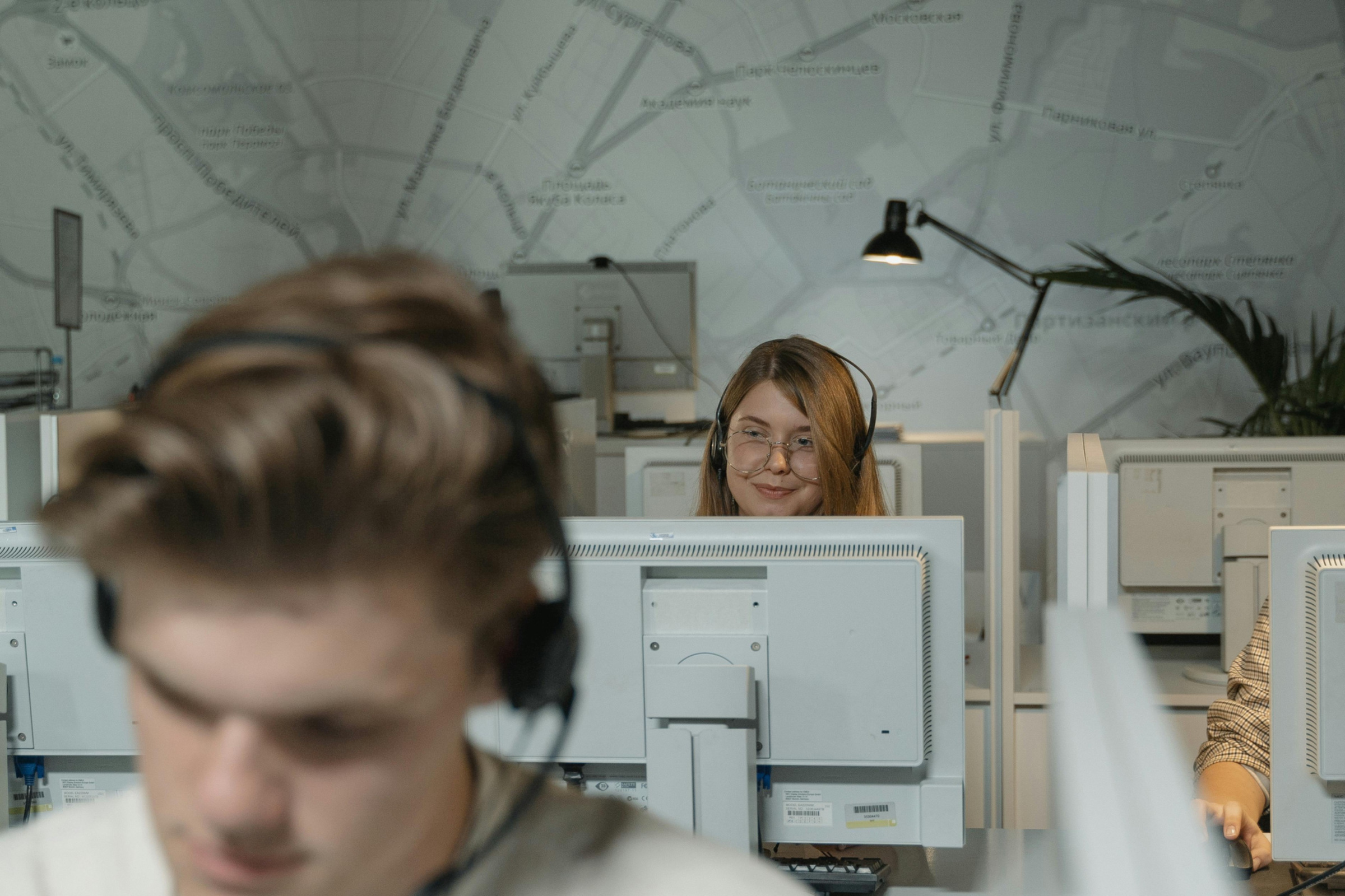 Two students taking a test in a computer lab